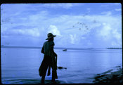 Ted Goble Collection, No. 37 Man At The Beach Holding A Talåya